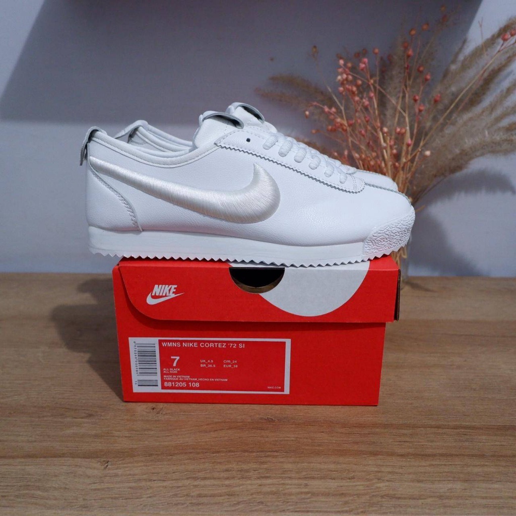 all white cortez nike