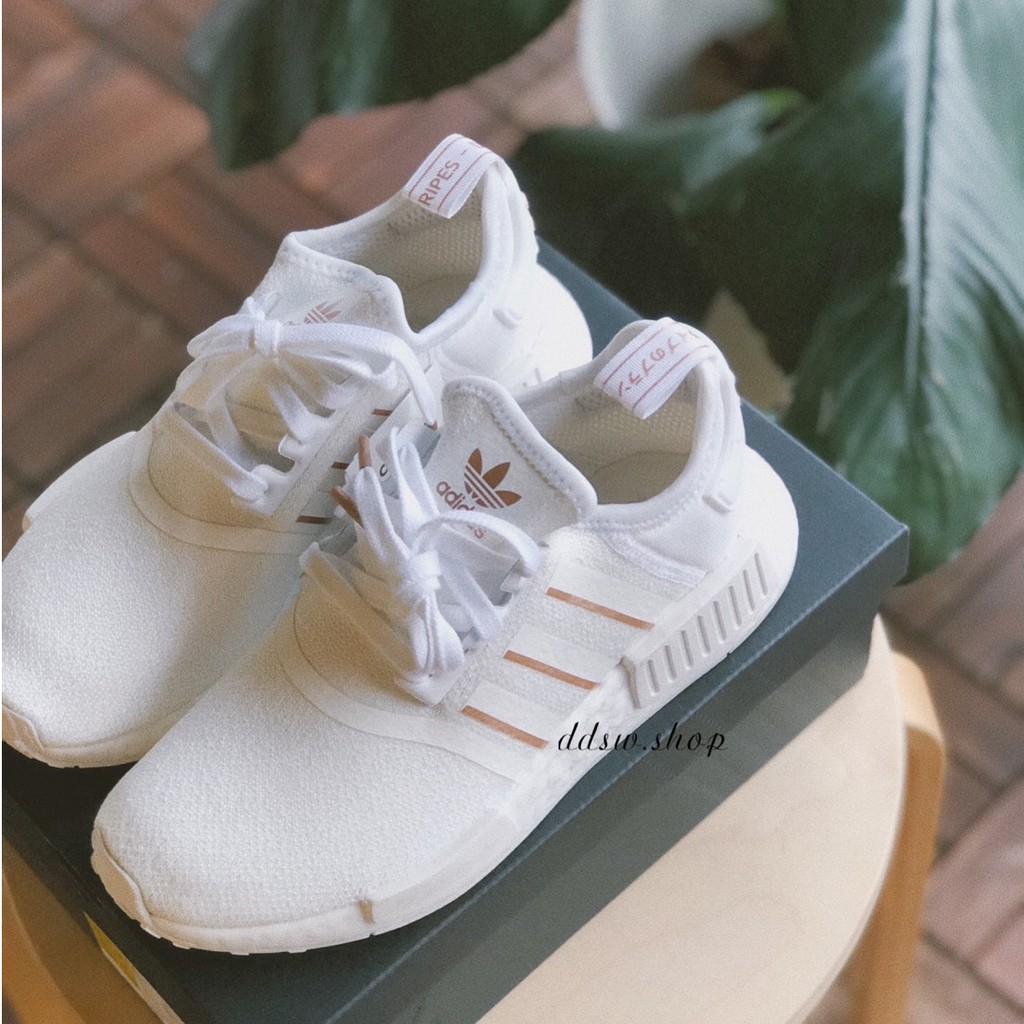 white nmd with rose gold