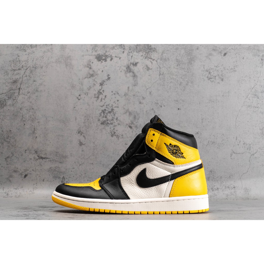 nike yellow and black high tops