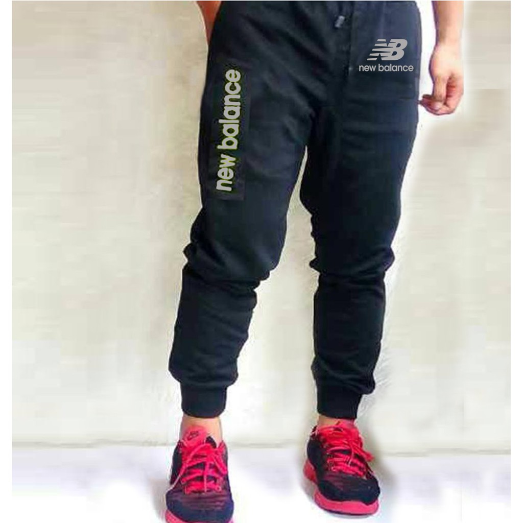 nike rally pants black