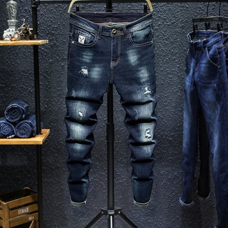 Image of Jeans stretch pants wild slim men's pants trend denim trousers Japanese Korean version of the wild work pants