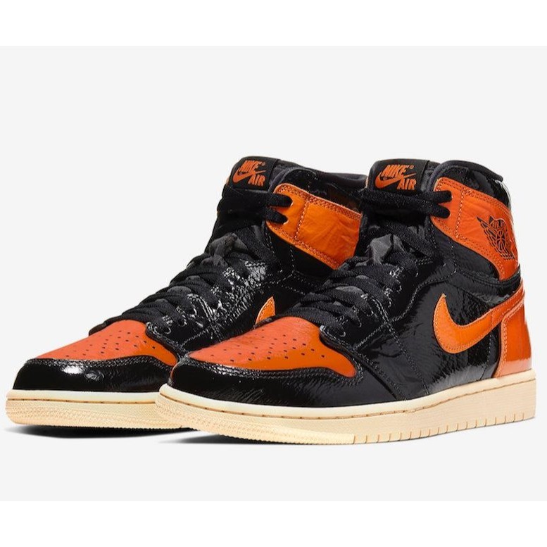 black orange jordan 1