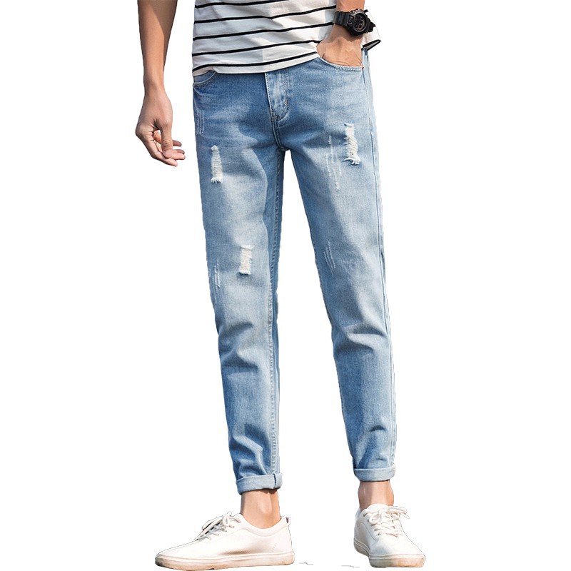 light blue torn jeans