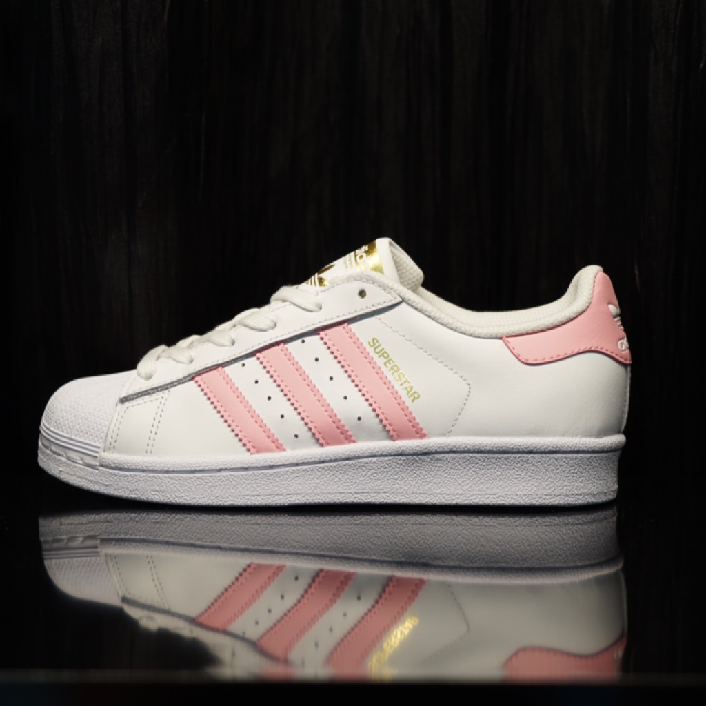 pink and white adidas superstars