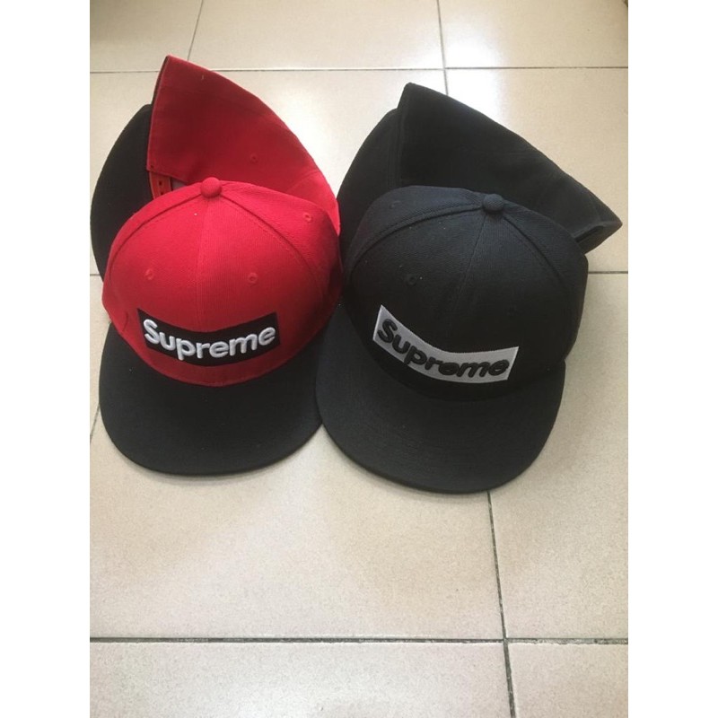 topi supreme