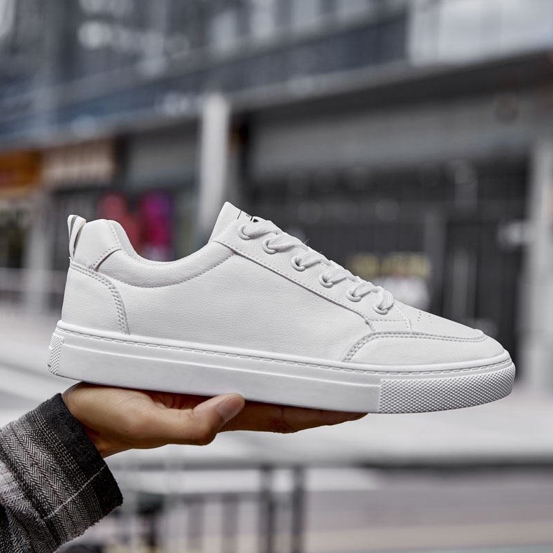 white leather low tops