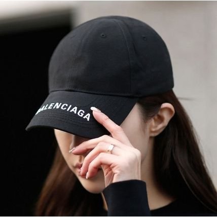 balenciaga cap on head