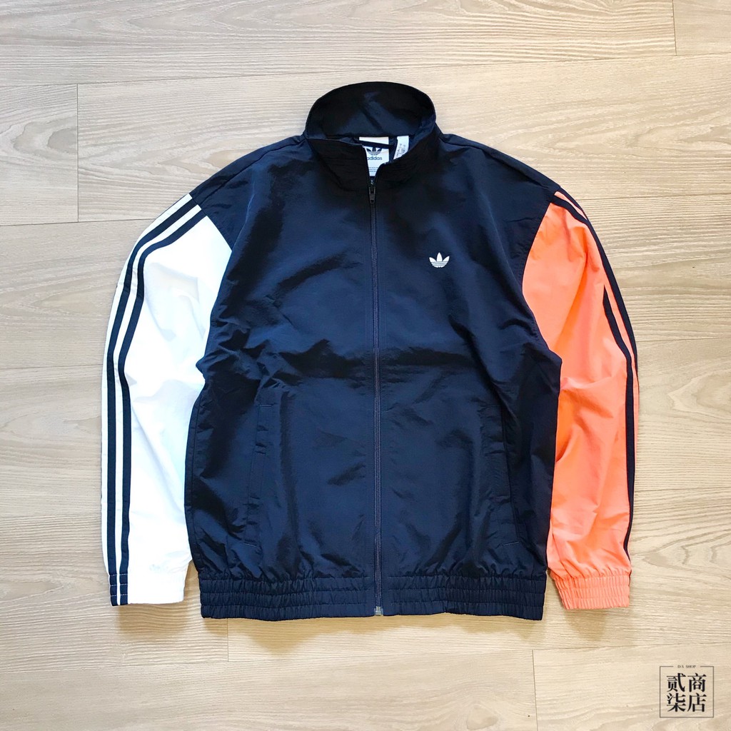 orange and white adidas jacket