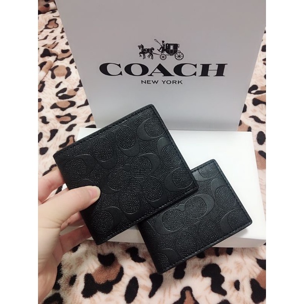 coach vertical wallet