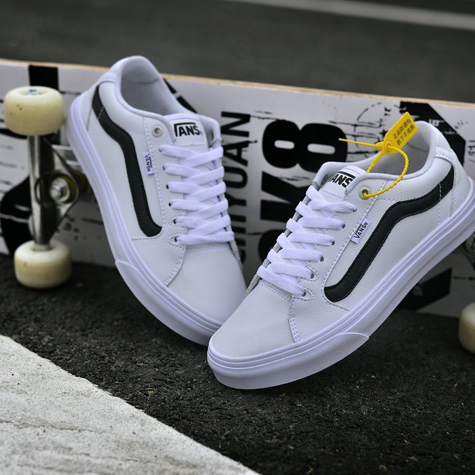 white leather vans womens