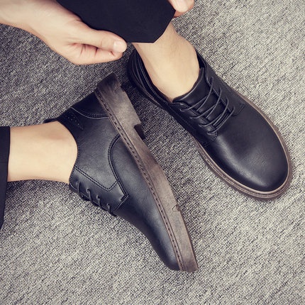 black oxford shoes with brown sole