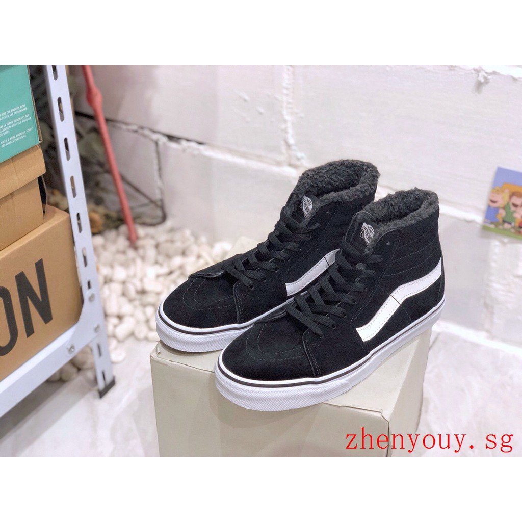 vans black high top shoes