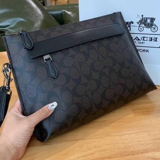 coach men clutch
