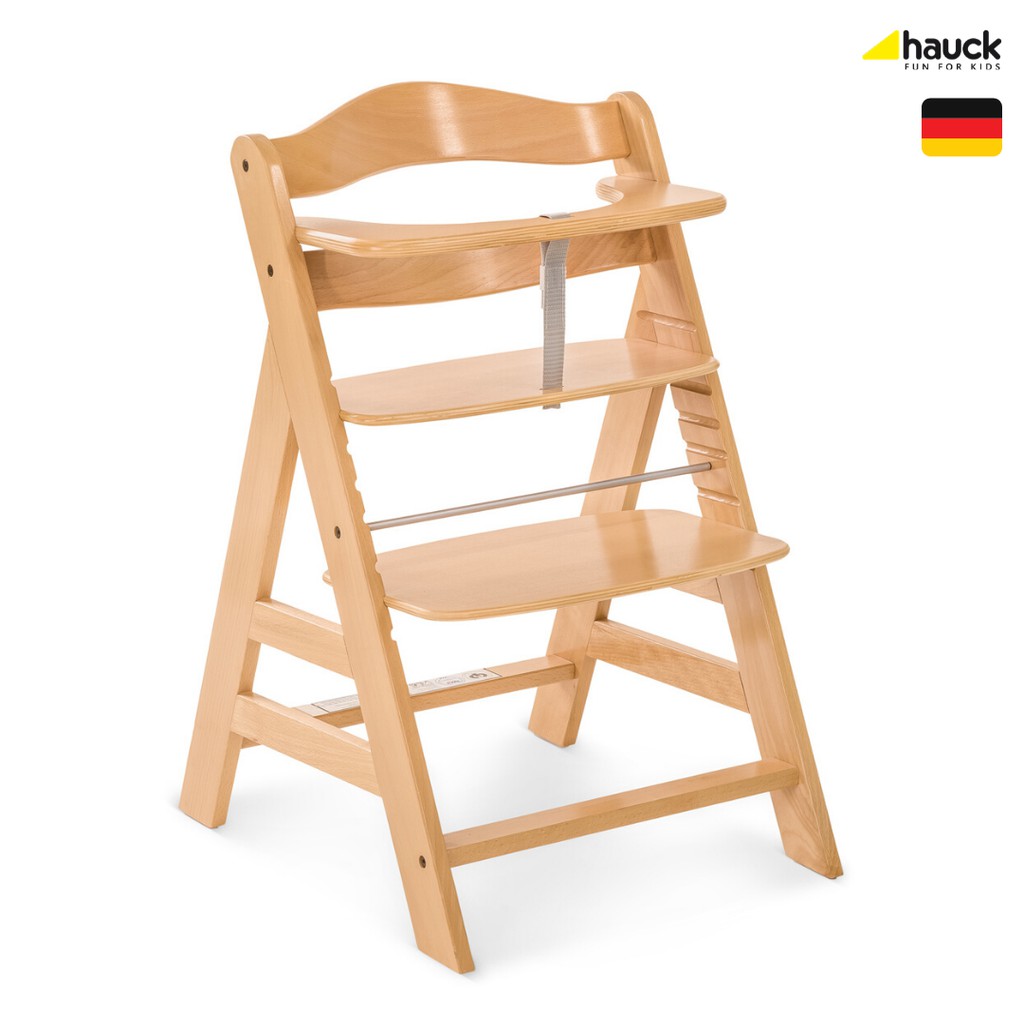 wooden high chair that grows with child