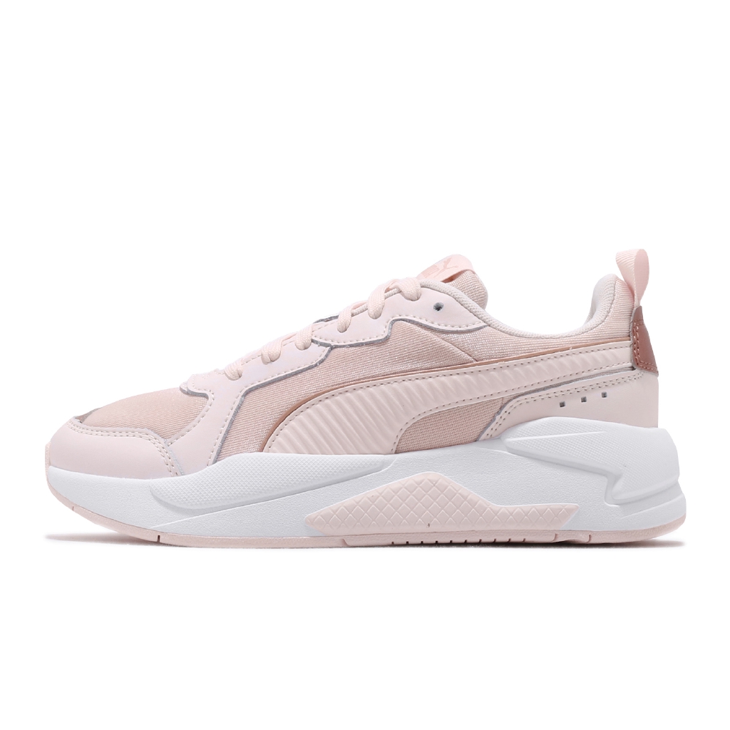 gold and white puma sneakers