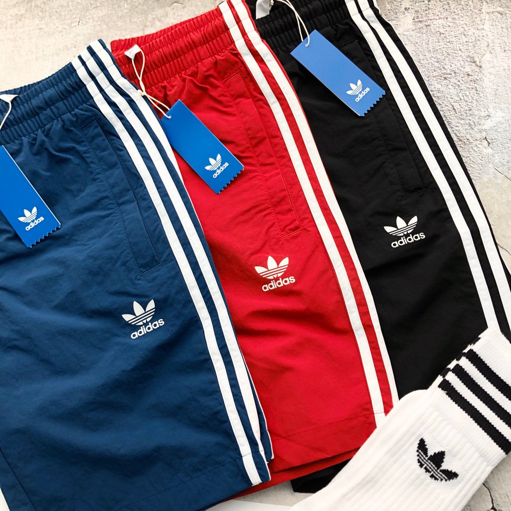 red adidas wind pants