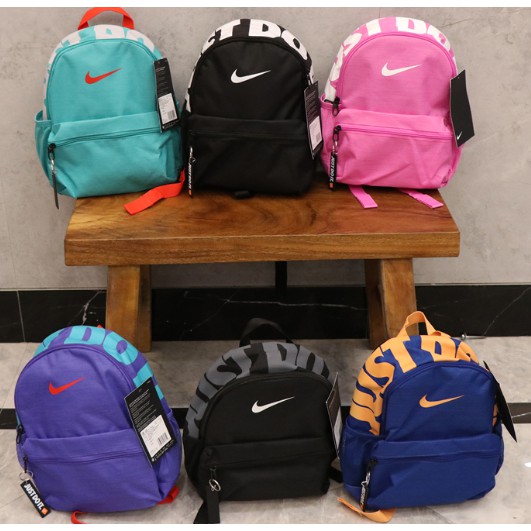 purple and black nike backpack