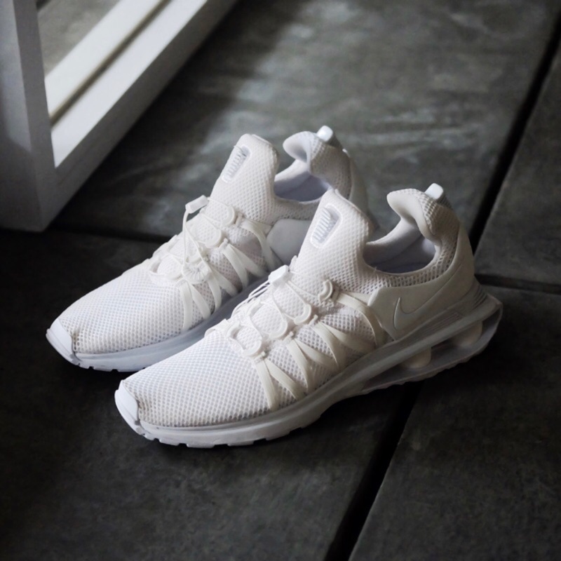 nike shox gravity triple white