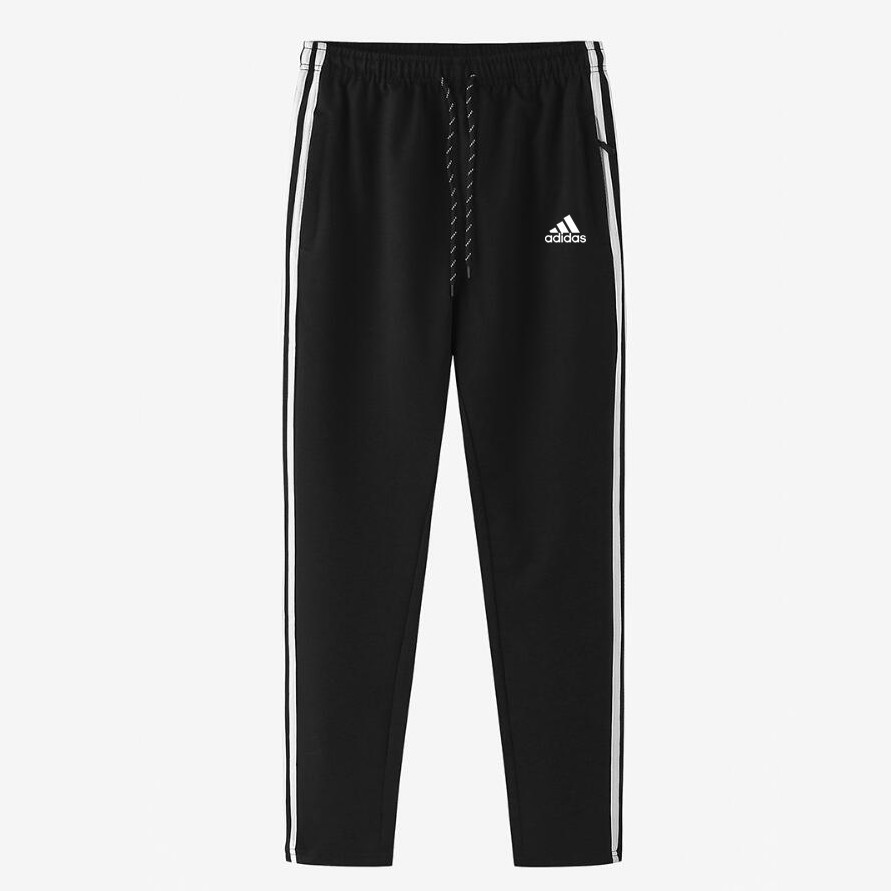 white and black adidas track pants