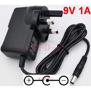 1PCS  AC/DC 9V 1A Switching Power Supply For guitar foot pedal Effect adapter Reverse Polarity Negative Inside