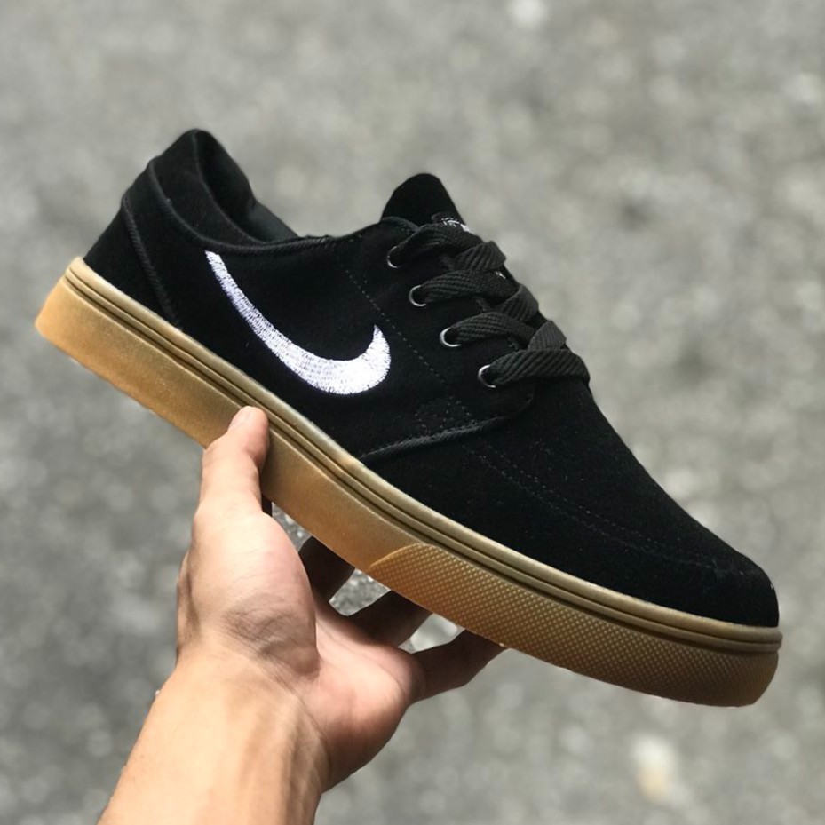 nike janoski black gum sole