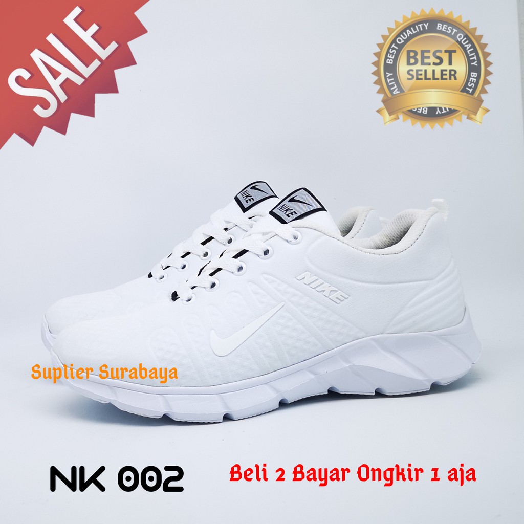 white sports shoes for boys