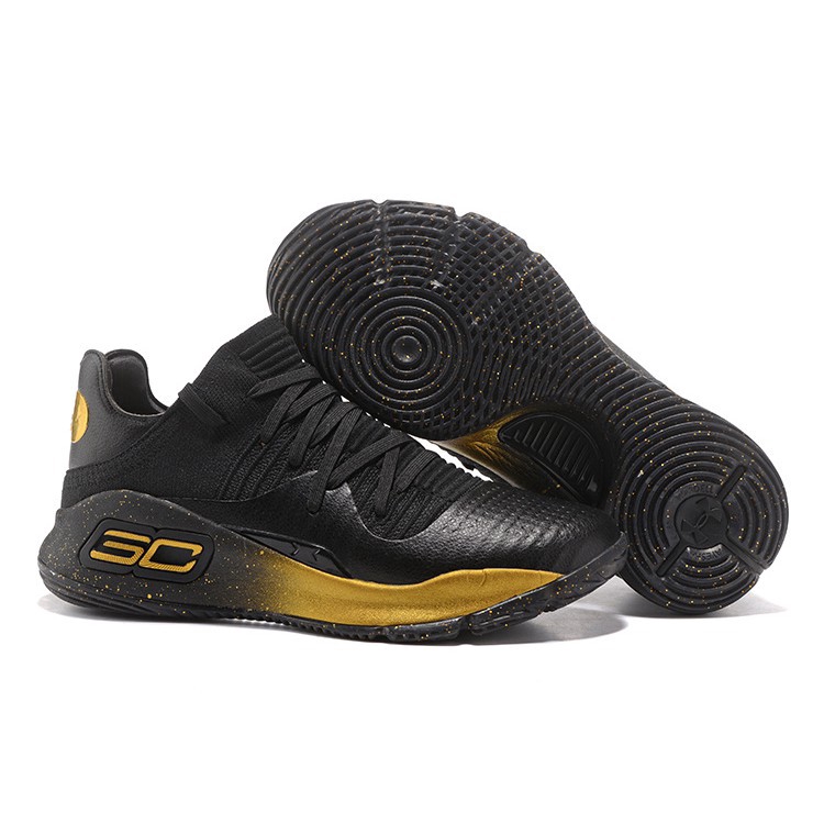 gold and black under armour shoes
