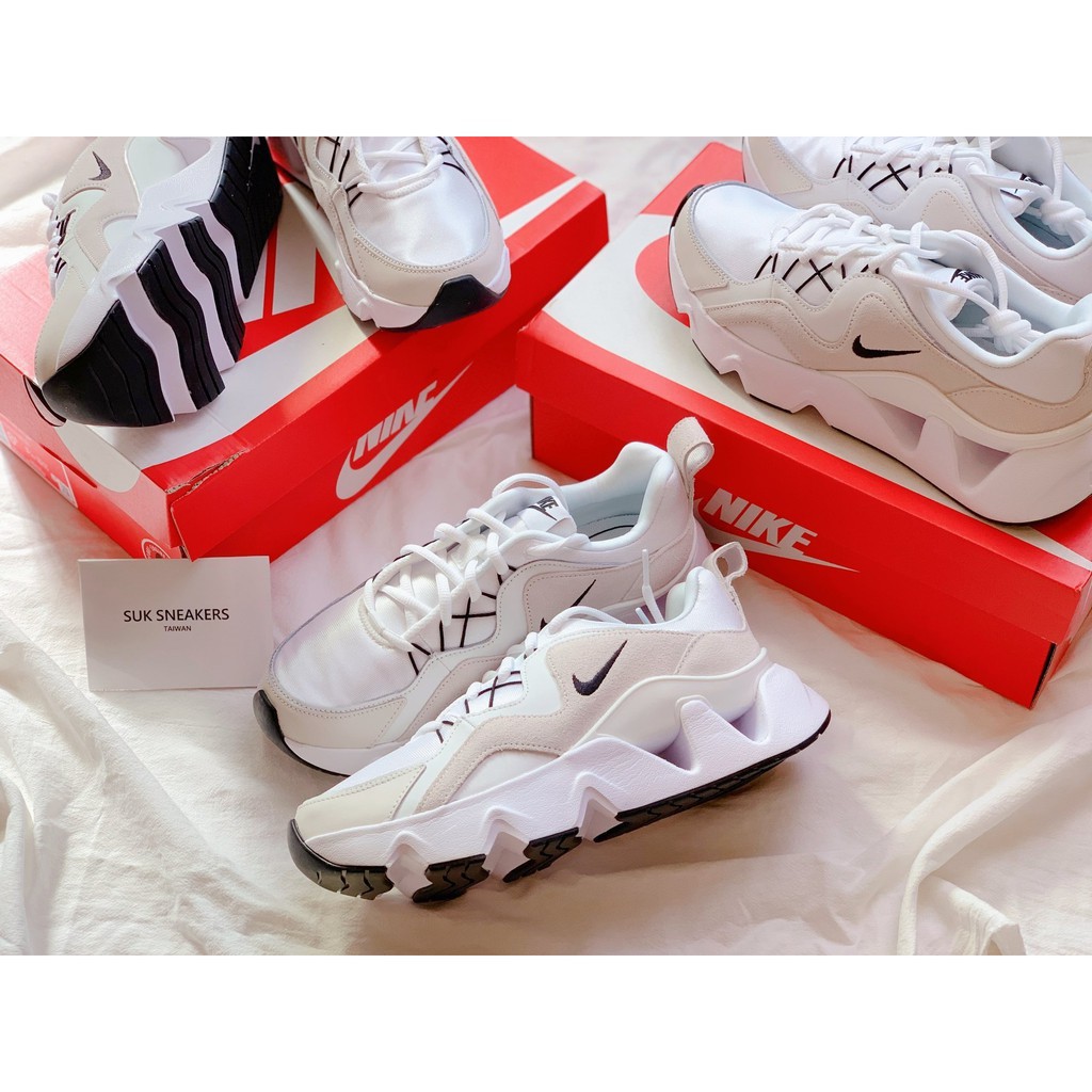gray nike trainers