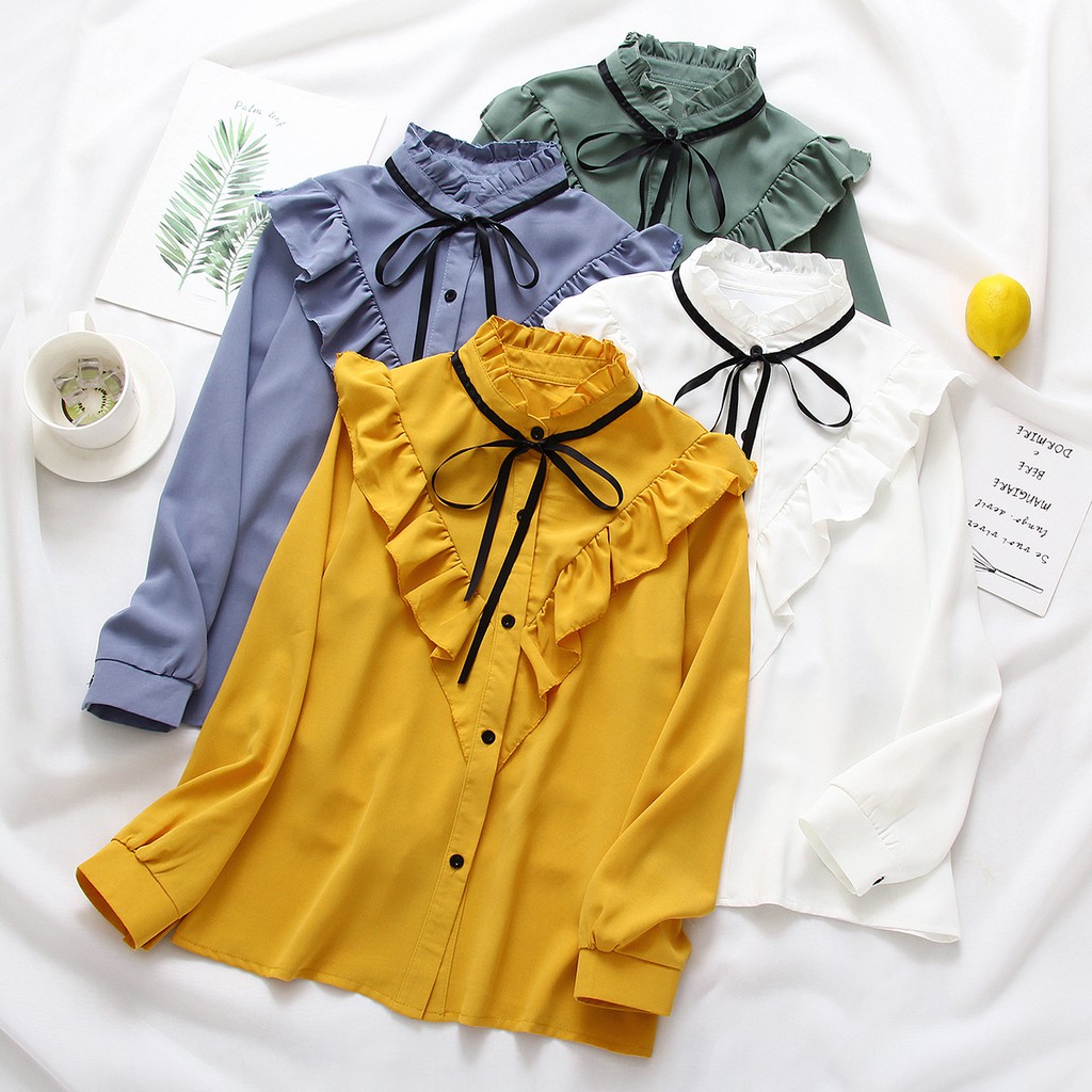 gold ruffle shirt