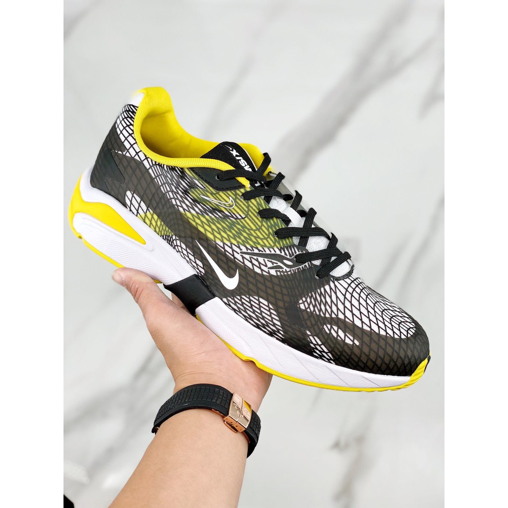 gray and yellow nikes