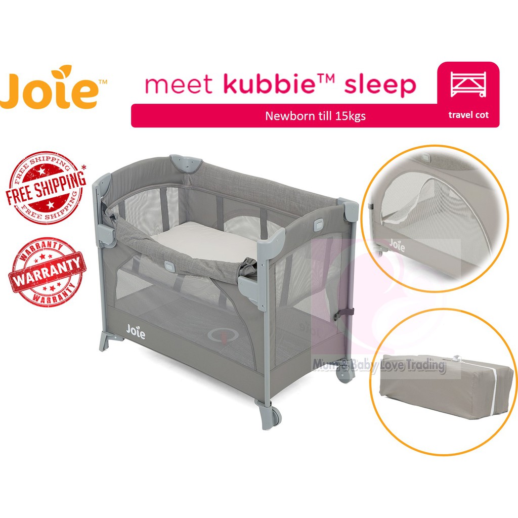 travel cot bedside