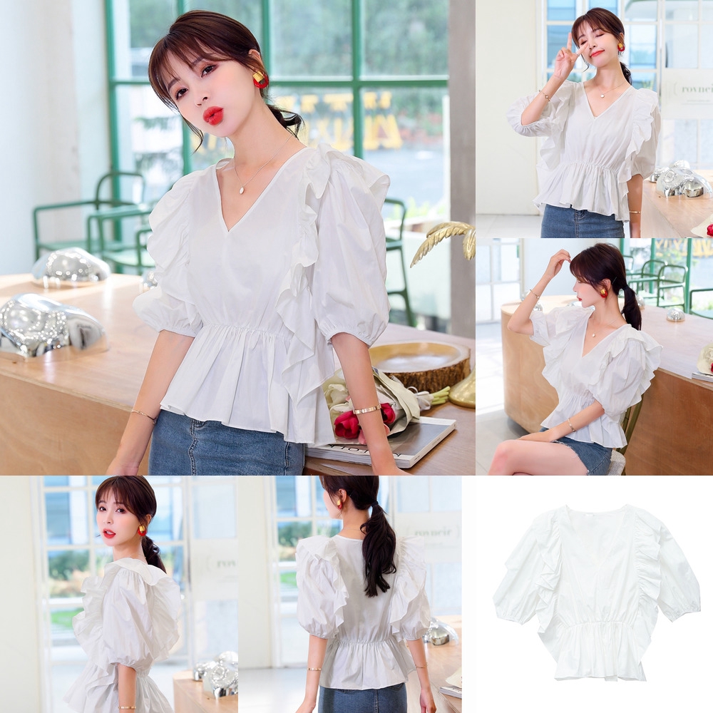 white blouse with ruffle neck