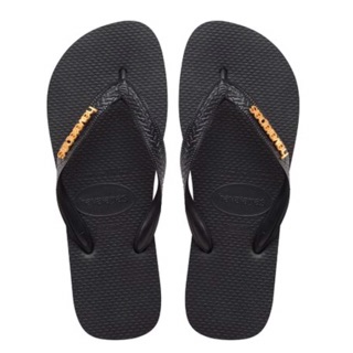 gold and white havaianas