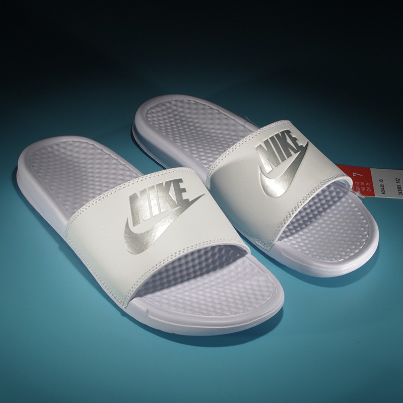 gray nike slides womens