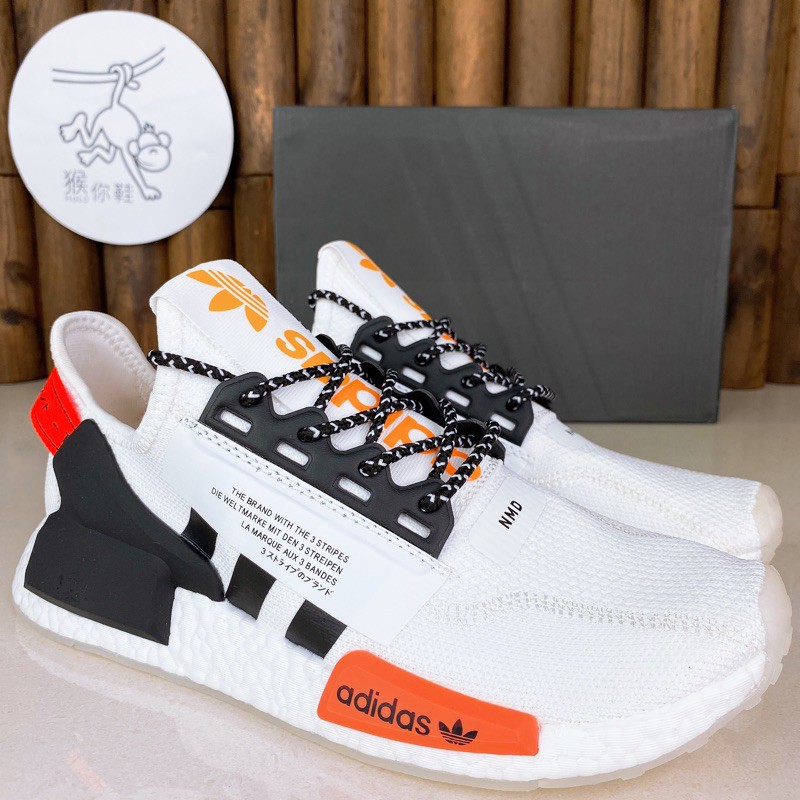 white and orange adidas shoes