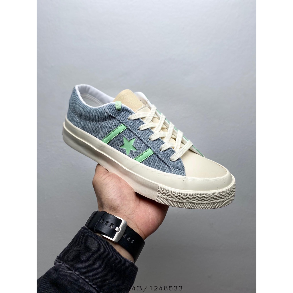 gray and green converse
