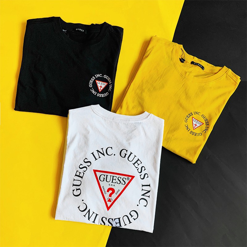 black and yellow guess shirt