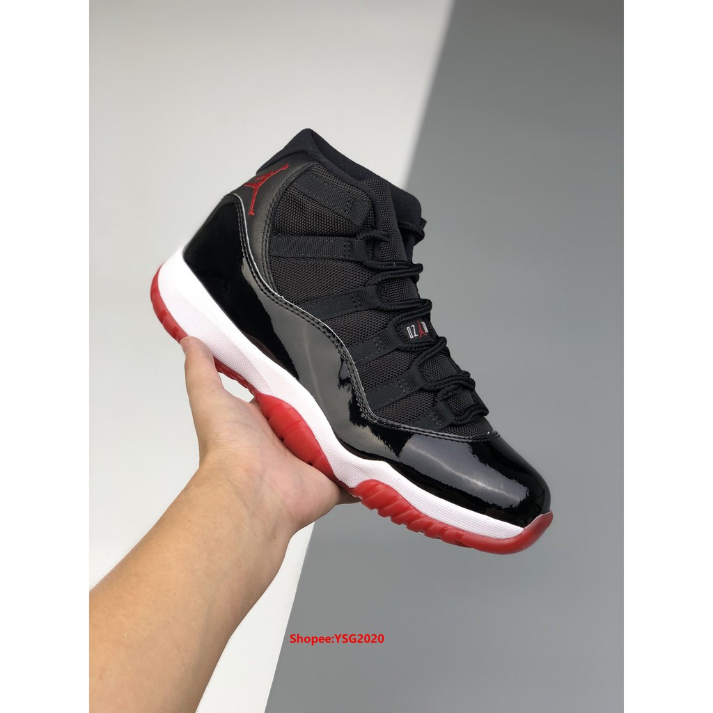 red and white air jordan 11