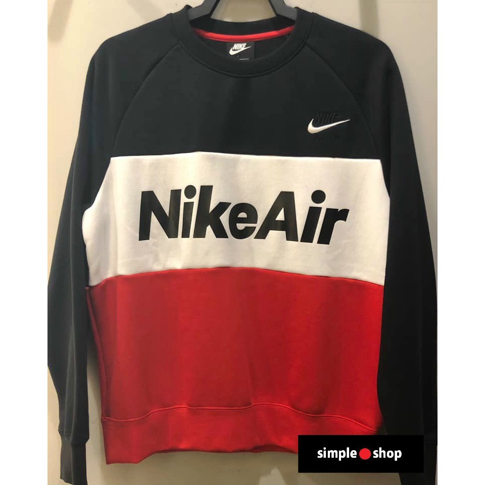 red and white nike shirt