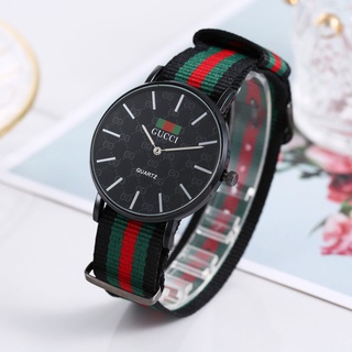 GUCCI Ladies Fashion Simple Canvas Strap Quartz Watch / Woven Nylon Strap Casual Couple Watch