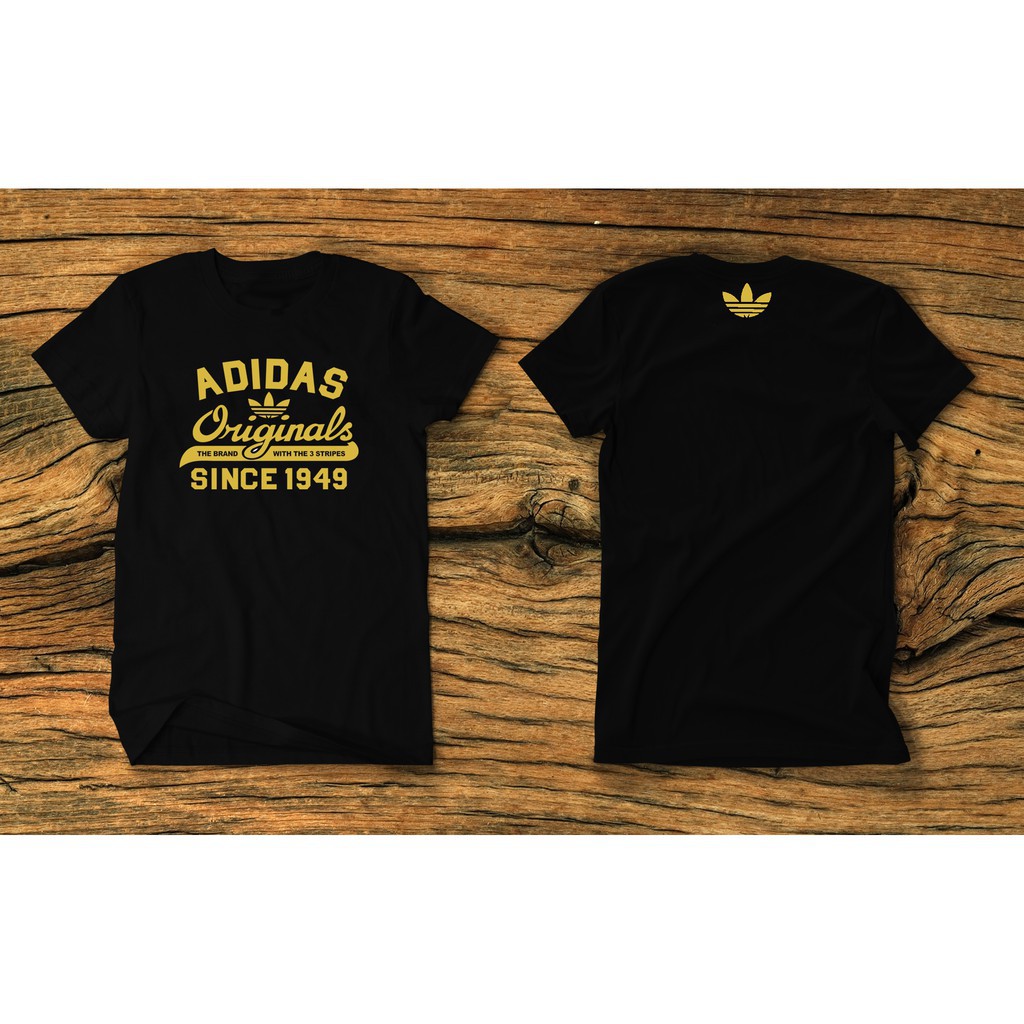 black adidas shirt with gold logo