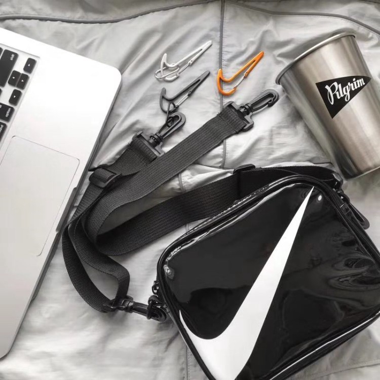 nike mini swoosh pvc sling bag