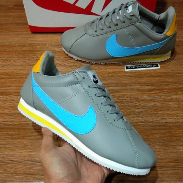 blue yellow nike cortez