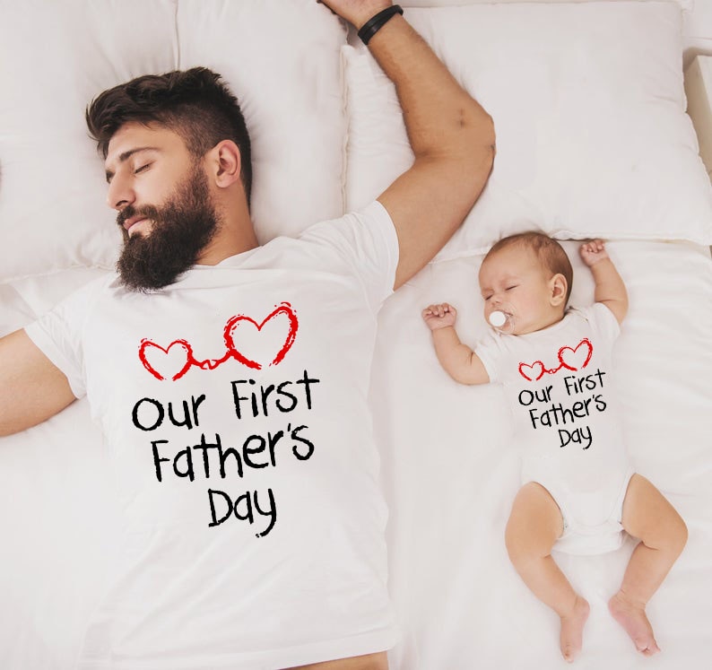 dad and newborn son matching shirts