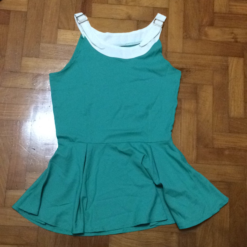 green peplum shirt