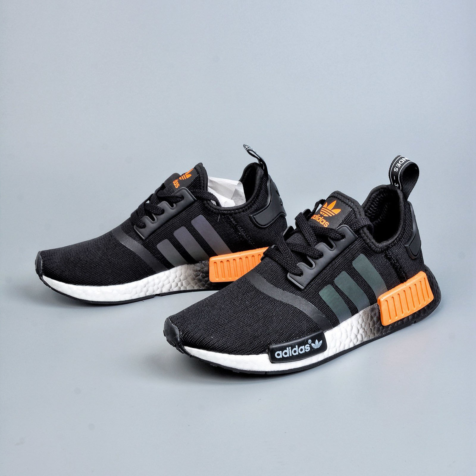 nmd r1 black orange