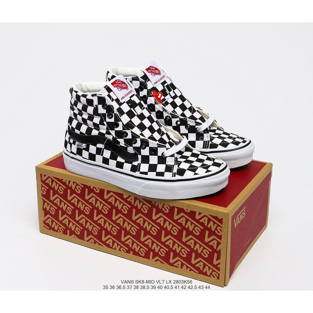 high top black checkered vans