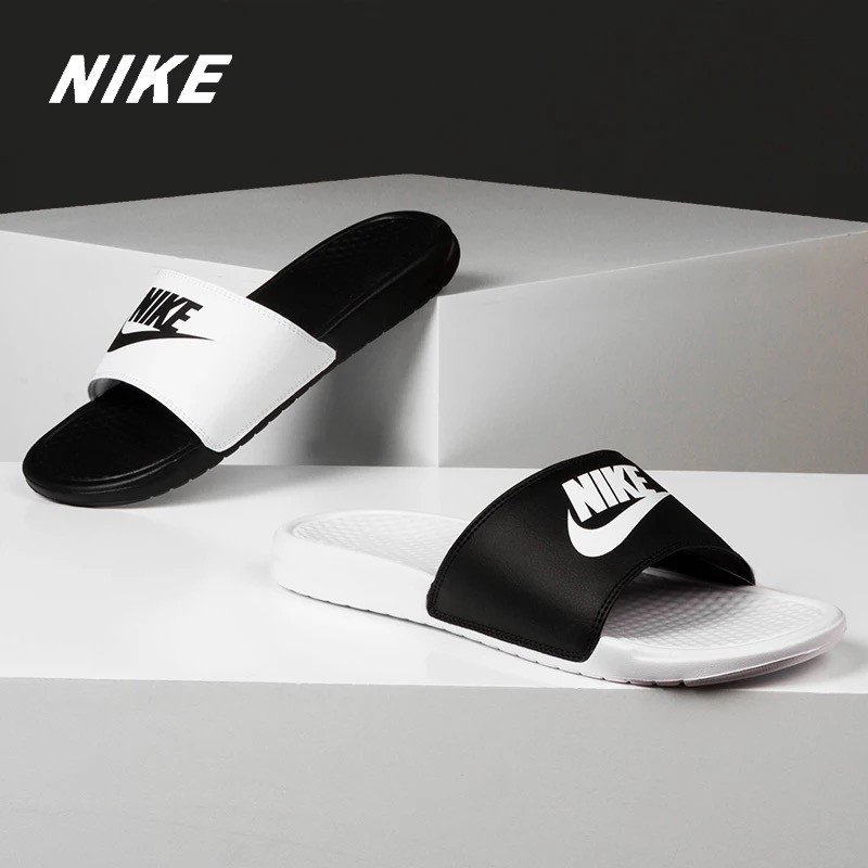 nike slipper black and white