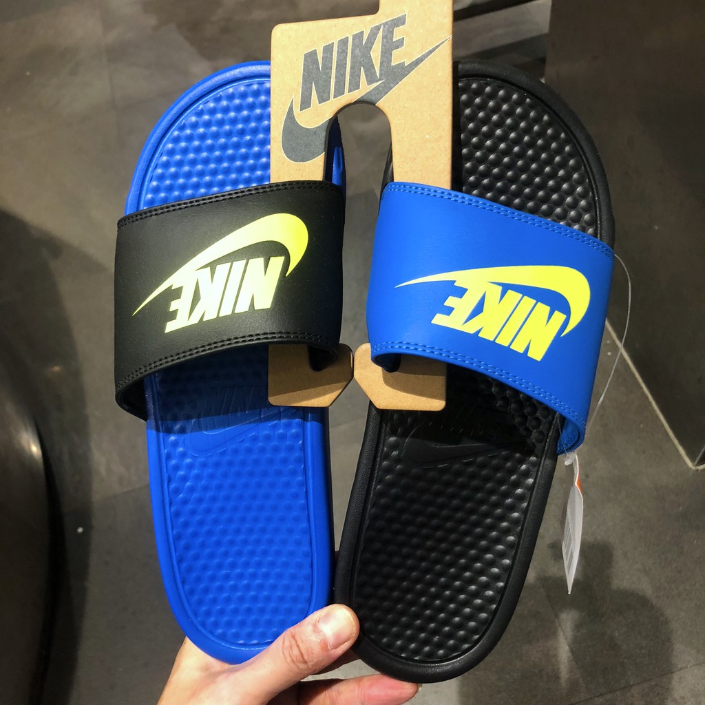 nike slippers blue and black