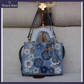 coach jeans bag